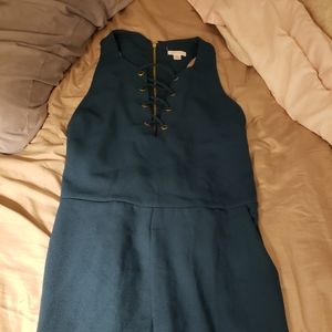 BNWOT  green lack up romper size m